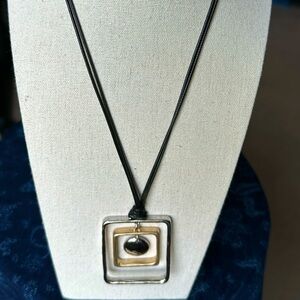 Chico's Interlocking Silver and Gold Tone Square
Pendant Necklace